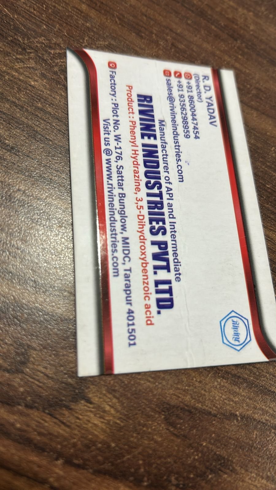 Rivine Industries business card